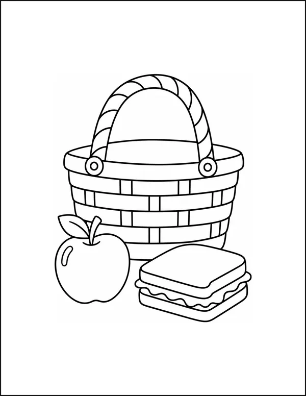 A picnic basket beside an apple and a sandwich cut in half.
